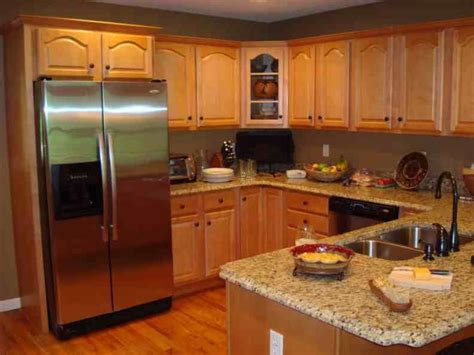 stainless steel appliances with honey oak cabinets|honey oak kitchen designs.